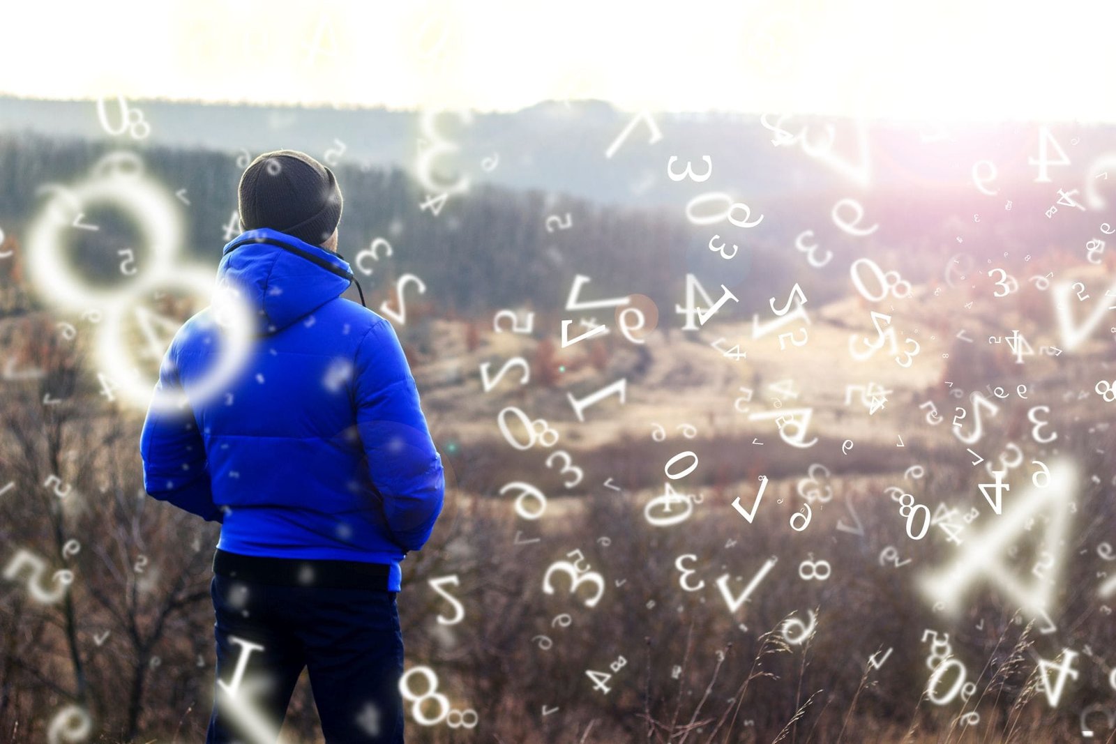 numerology, guy alone looks into the distance in the steppe surrounded by numbers